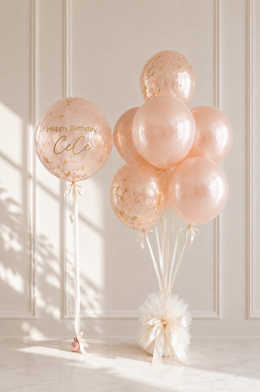 Navy and gold glass-finish balloon bouquet with custom lettering by Air with a Flair